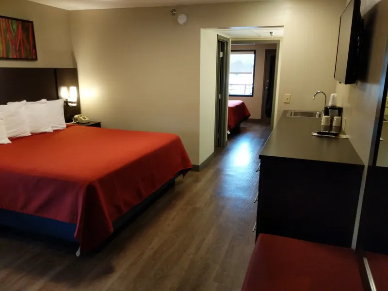View through the doorway between the two bedrooms of the family suite